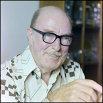 Man Looks Thoughtful During Card Game in Beverly Hills, Florida, E by Skip Gandy