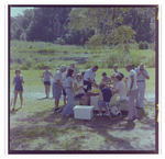 Guests Eat Watermelon Around Picnic Table in Beverly Hills, Florida, D by Skip Gandy