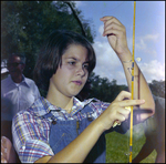 Child Strings a Fishing Rod in Beverly Hills, Florida by Skip Gandy