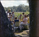 Guests Eat Watermelon Around Picnic Table in Beverly Hills, Florida, E by Skip Gandy