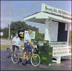 A Couple on Bicycles Grab Copies of the St. Petersburg Times in Beverly Hills, Florida, C