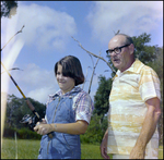 Man Instructs Child on Using Fishing Rod in Beverly Hills, Florida, F by Skip Gandy