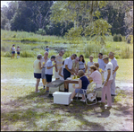 Guests Eat Watermelon Around Picnic Table in Beverly Hills, Florida, G by Skip Gandy