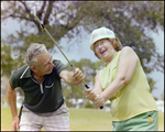 Couple Plays Golf Together in Beverly Hills, Florida, L by Skip Gandy