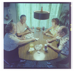 Two Couples Play Cards Together in Beverly Hills, Florida, C by Skip Gandy