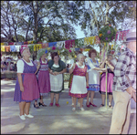 Women Hold Floral Garland for Maypole at German American Social Club Festival in Beverly Hills, Florida by Skip Gandy