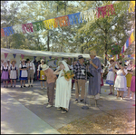 Bride Stands Next to Man With Decorative Shotgun at German American Social Club Festival in Beverly Hills, Florida, C by Skip Gandy