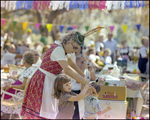 Woman Leads Two Small Children at German American Social Club Festival in Beverly Hills, Florida, A by Skip Gandy