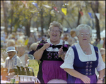 Two Women in Traditional Dresses at German American Social Club Festival in Beverly Hills, Florida, D by Skip Gandy