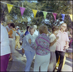 Two Friends Greet Each Other at German American Social Club Festival in Beverly Hills, Florida by Skip Gandy