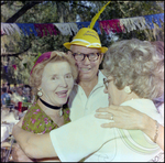 Four Friends Embrace at German American Social Club Festival in Beverly Hills, Florida, A by Skip Gandy