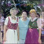 Three Women Embrace for Photo at German American Social Club Festival in Beverly Hills, Florida, D by Skip Gandy