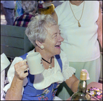 Woman Brandishes Mug From Bavarian Summer Festival at German American Social Club Event in Beverly Hills, Florida by Skip Gandy