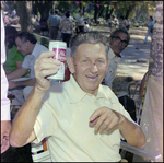 Man Raises His Beer Can at German American Social Club Event in Beverly Hills, Florida by Skip Gandy