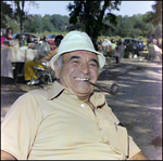 Man Smokes Pipe at German American Social Club Event in Beverly Hills, Florida, B by Skip Gandy