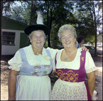 Two Women Embrace for Photo at German American Social Club Festival in Beverly Hills, Florida by Skip Gandy