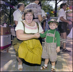 Woman Smiles With Toddler at German American Social Club Festival in Beverly Hills, Florida by Skip Gandy