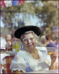 Woman Eats Pastry at German American Social Club Festival in Beverly Hills, Florida by Skip Gandy