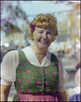 Woman Wears Pink Flowers in Hair at German American Social Club Festival in Beverly Hills, Florida by Skip Gandy