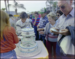 Women Pass Out Cake at Burnt Store Marina Seafood Festival in Punta Gorda, Florida, C by Skip Gandy