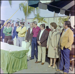 Man in Corduroy Jacket Addresses Crowd at Burnt Store Marina Seafood Festival in Punta Gorda, Florida, C by Skip Gandy