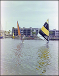 Two Windsurfers Sail at Burnt Store Marina Seafood Festival in Punta Gorda, Florida, A by Skip Gandy