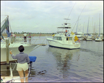 Boat Leaves Marina at Burnt Store Marina Seafood Festival in Punta Gorda, Florida by Skip Gandy