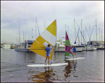 Two Windsurfers Sail at Burnt Store Marina Seafood Festival in Punta Gorda, Florida, C by Skip Gandy