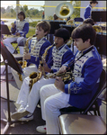 Three Student Brass Instrument Players at Burnt Store Marina Seafood Festival in Punta Gorda, Florida by Skip Gandy