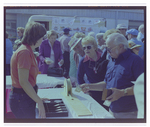 Guests Buy Raffle Tickets at Burnt Store Marina Seafood Festival in Punta Gorda, Florida, A by Skip Gandy