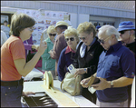 Guests Buy Raffle Tickets at Burnt Store Marina Seafood Festival in Punta Gorda, Florida, B by Skip Gandy