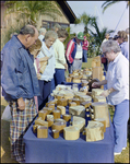 Guests Browse Wooden Wares at Burnt Store Marina Seafood Festival in Punta Gorda, Florida, A by Skip Gandy