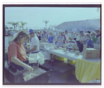 Staff Members Serve Food at Burnt Store Marina Seafood Festival in Punta Gorda, Florida, C by Skip Gandy