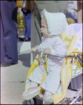 Baby Sits Upright in Stroller at Burnt Store Marina Seafood Festival in Punta Gorda, Florida by Skip Gandy