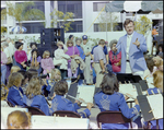 School Band Plays in Folding Chairs at Burnt Store Marina Seafood Festival in Punta Gorda, Florida, D by Skip Gandy