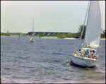 Several Boats Sailing Through the Bay, Burnt Store Marina Seafood Festival in Punta Gorda, Florida, E by Skip Gandy