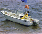 Boat, Aquasport, Anchored in the Water, Burnt Store Marina Seafood Festival in Punta Gorda, Florida by Skip Gandy