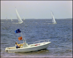 Aquasport, Anchored in the Water As Sailboats Pass by, Burnt Store Marina Seafood Festival in Punta Gorda, Florida, H by Skip Gandy