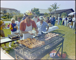 Two Men Cooking on Grill As Others Wait in Line, Burnt Store Marina Seafood Festival, Punta Gorda, Florida, A by Skip Gandy