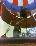 Woman Standing in Hot Air Balloon Basket, Tampa, Florida by George Skip Gandy IV