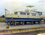 Houseboat Resting on a Dock, Tampa, Florida, A by George Skip Gandy IV