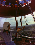 Woman in Balloon Canopy in the Sky Over Tampa, Florida by George Skip Gandy IV