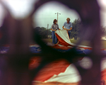 Man and Woman Inspecting a Balloon by George Skip Gandy IV