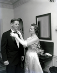 Lillian Mildred Woodbery Adjusts Doyle E. Carlton Jr.'s Bow Tie Before Formal Event, Osprey, Florida by George Skip Gandy IV