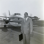 Businessman by Beechcraft Private Plane, Tampa, Florida, C by George Skip Gandy IV