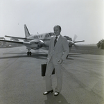 Businessman by Beechcraft Private Plane, Tampa, Florida, F by George Skip Gandy IV