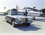 Chauffeur with Rolls Royce Silver Shadow and Piper Navajo Private Plane, Tampa, Florida, D by George Skip Gandy IV