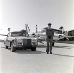 Chauffeur with Rolls Royce Silver Shadow and Piper Navajo Private Plane, Tampa, Florida, J by George Skip Gandy IV