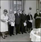 Group of People Holding Certificates at Community Concert Association Birthday Event, Tampa, Florida by George Skip Gandy IV