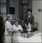 Mrs. Eliot Fletcher and Mrs. Leland Carlton Talking Over Tea Set at Community Concert Association Birthday Event, Tampa, Florida, B by George Skip Gandy IV